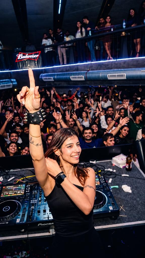DJ Rihya performing live at the console